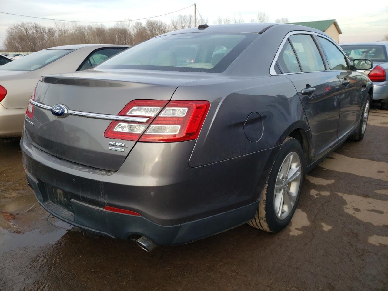 Photo 4 from auction – 2013 FORD TAURUS SEL with VIN 1FAHP2E9XDG143316