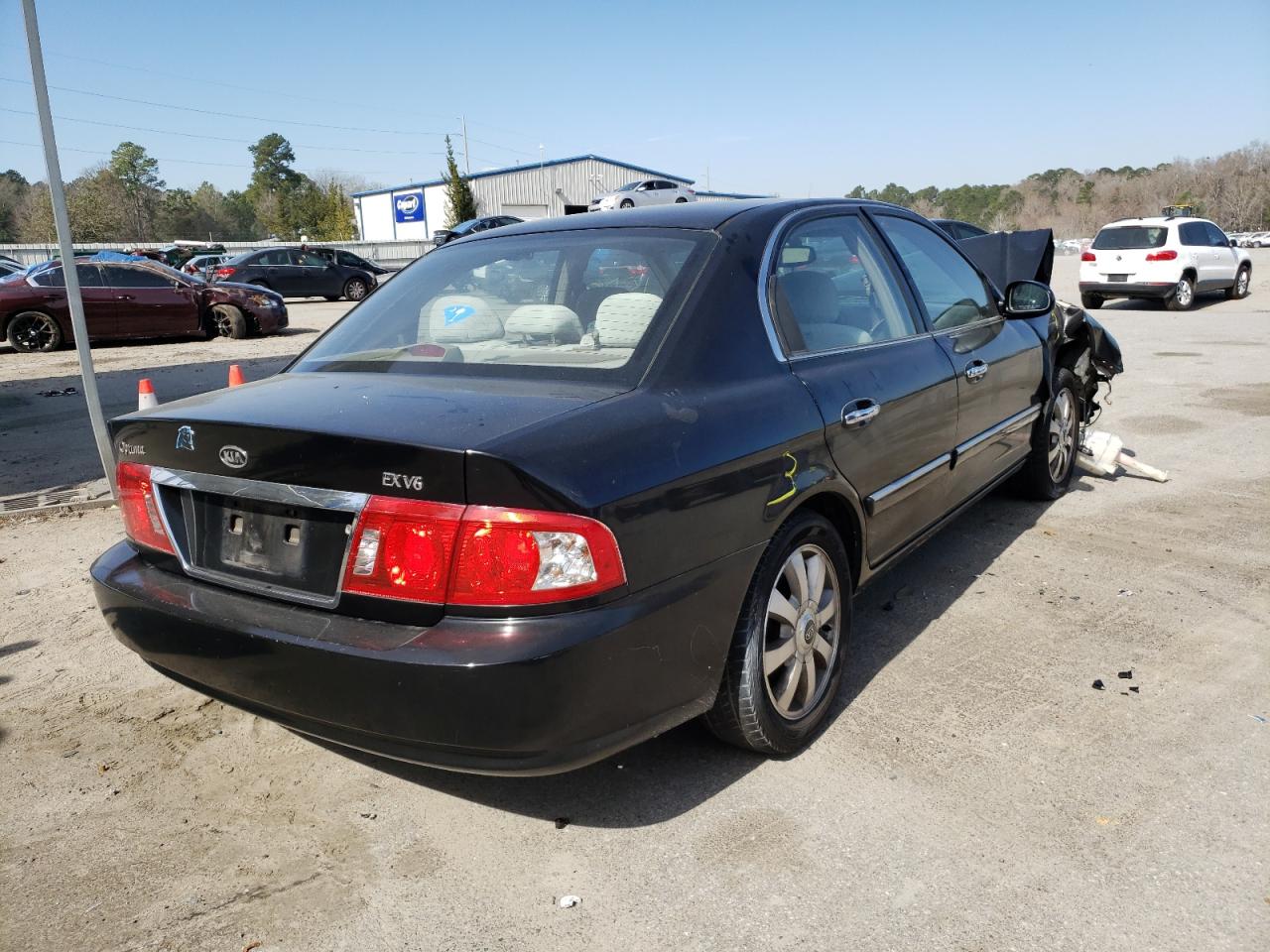 Photo 4 from auction – 2006 KIA OPTIMA LX with VIN KNAGD128865456557