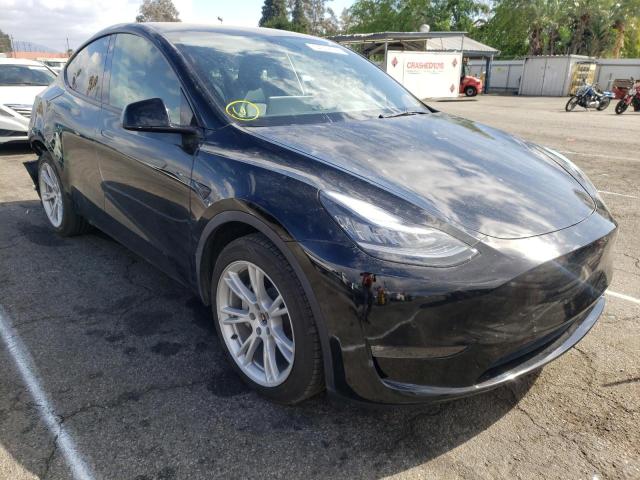 TESLA MODEL Y 2021 with VIN 5YJYGDEE7MF161155 - Photo from auction