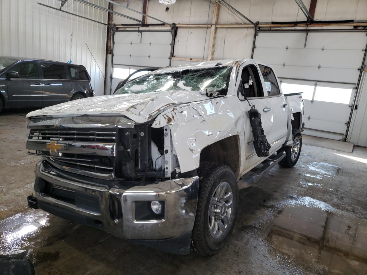 Photo 2 from auction – 2018 CHEVROLET SILVERADO with VIN 1GC1KWEG4JF184574
