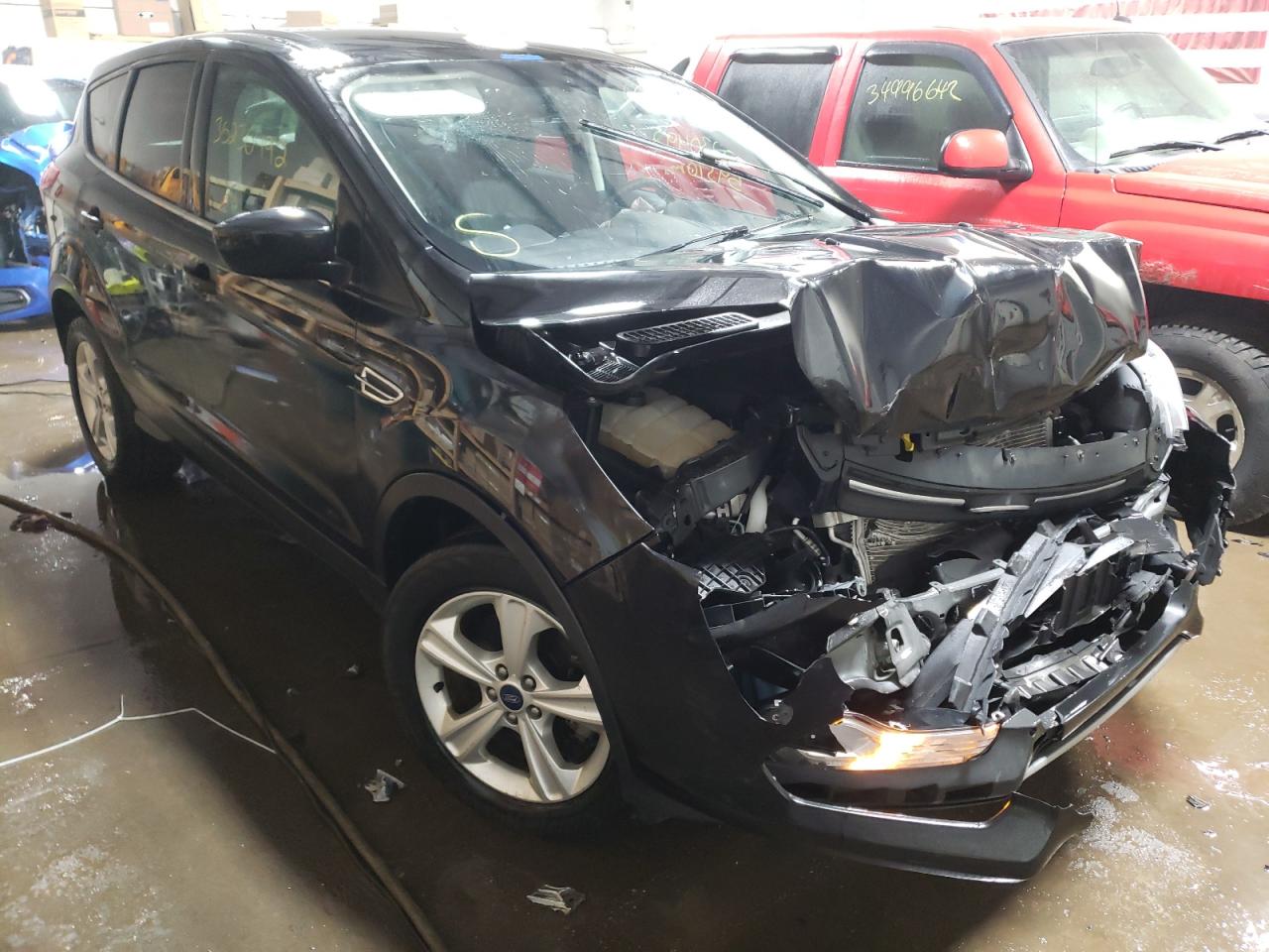 FORD ESCAPE SE 2014 with VIN 1FMCU9G90EUC73784 - Photo from auction