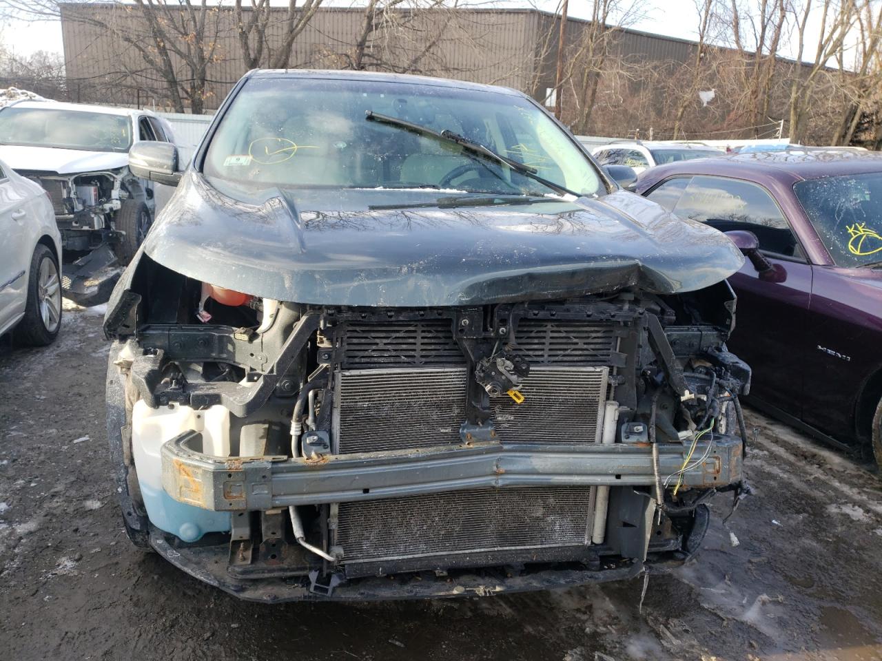 Photo 9 from auction – 2015 FORD EDGE TITAN with VIN 2FMTK4K84FBB94097