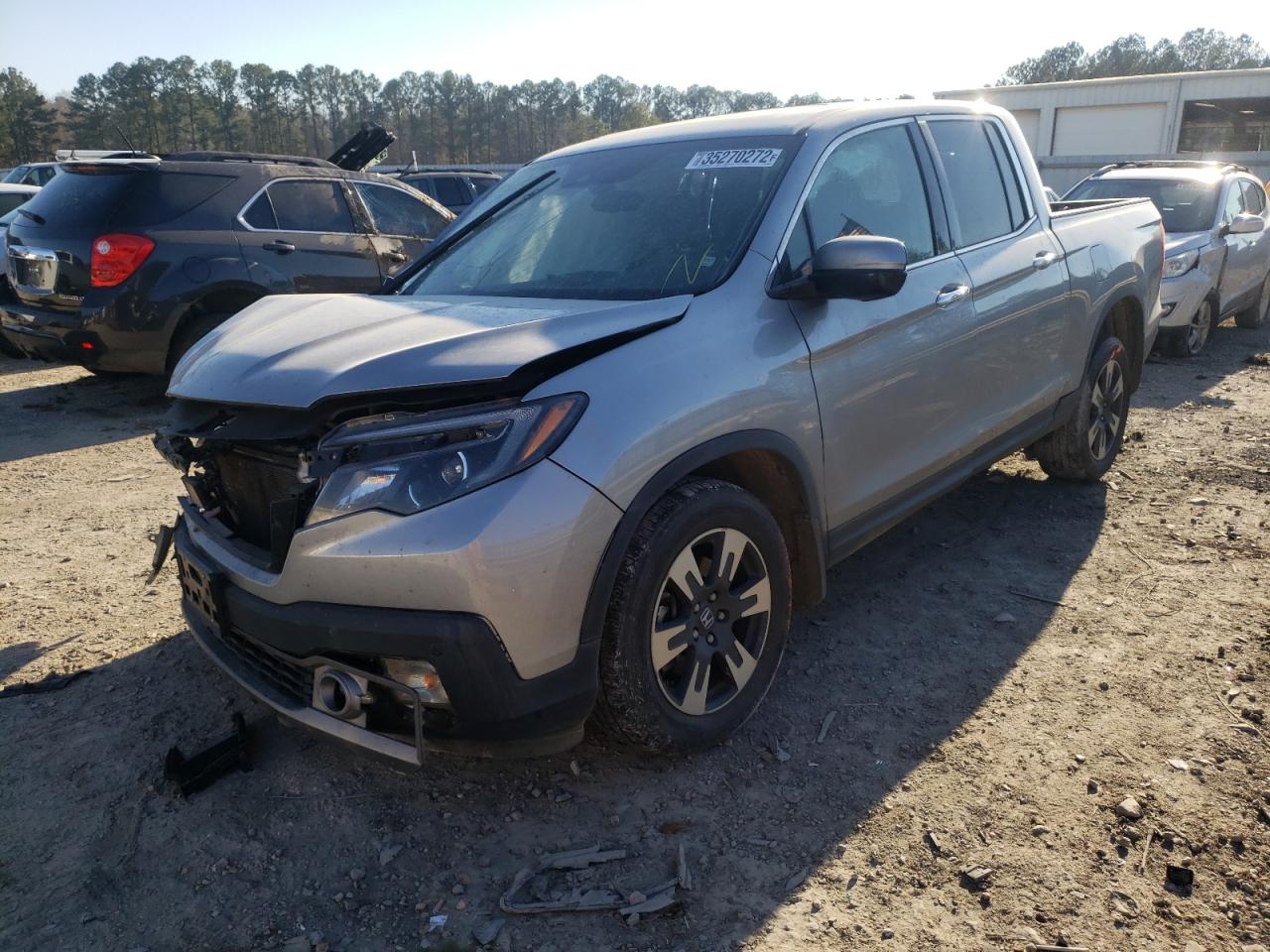 Photo 2 from auction – 2018 HONDA RIDGELINE with VIN 5FPYK3F79JB000463