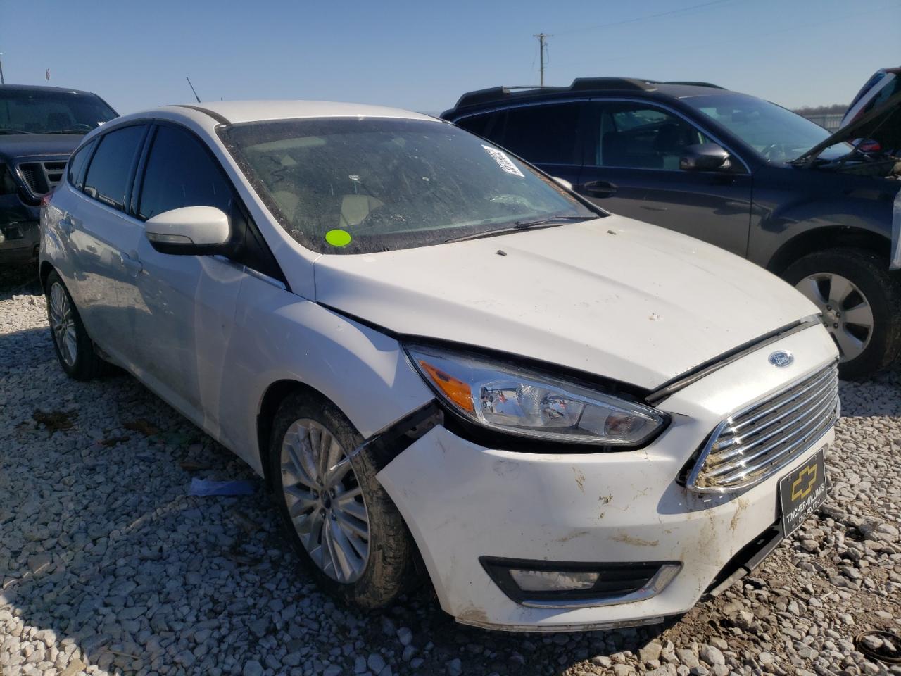 FORD FOCUS TITA 2016 with VIN 1FADP3N26GL307938 - Photo from auction