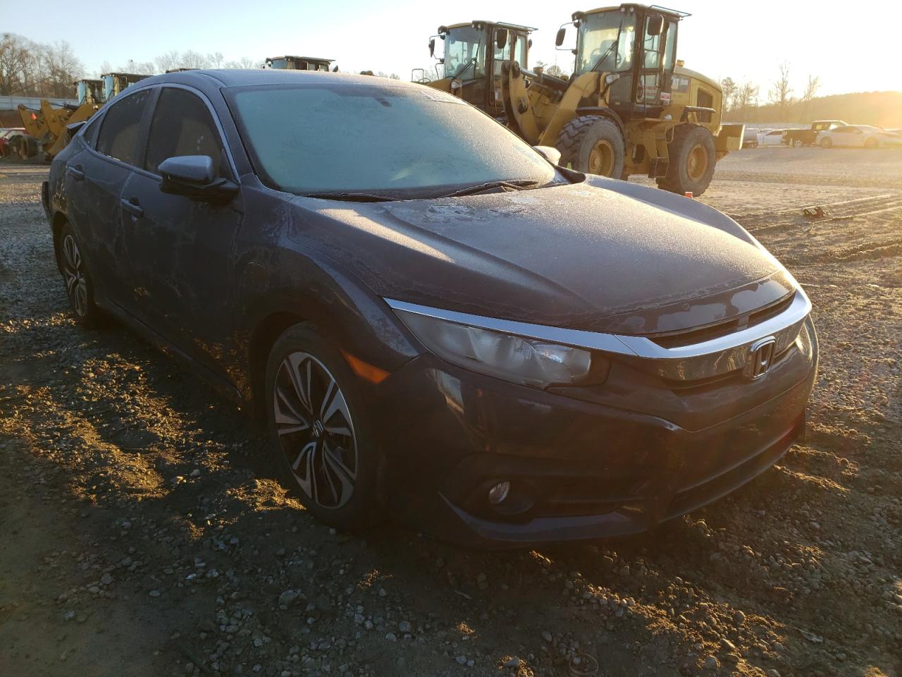 HONDA CIVIC EX 2016 with VIN 19XFC1F33GE016865 - Photo from auction