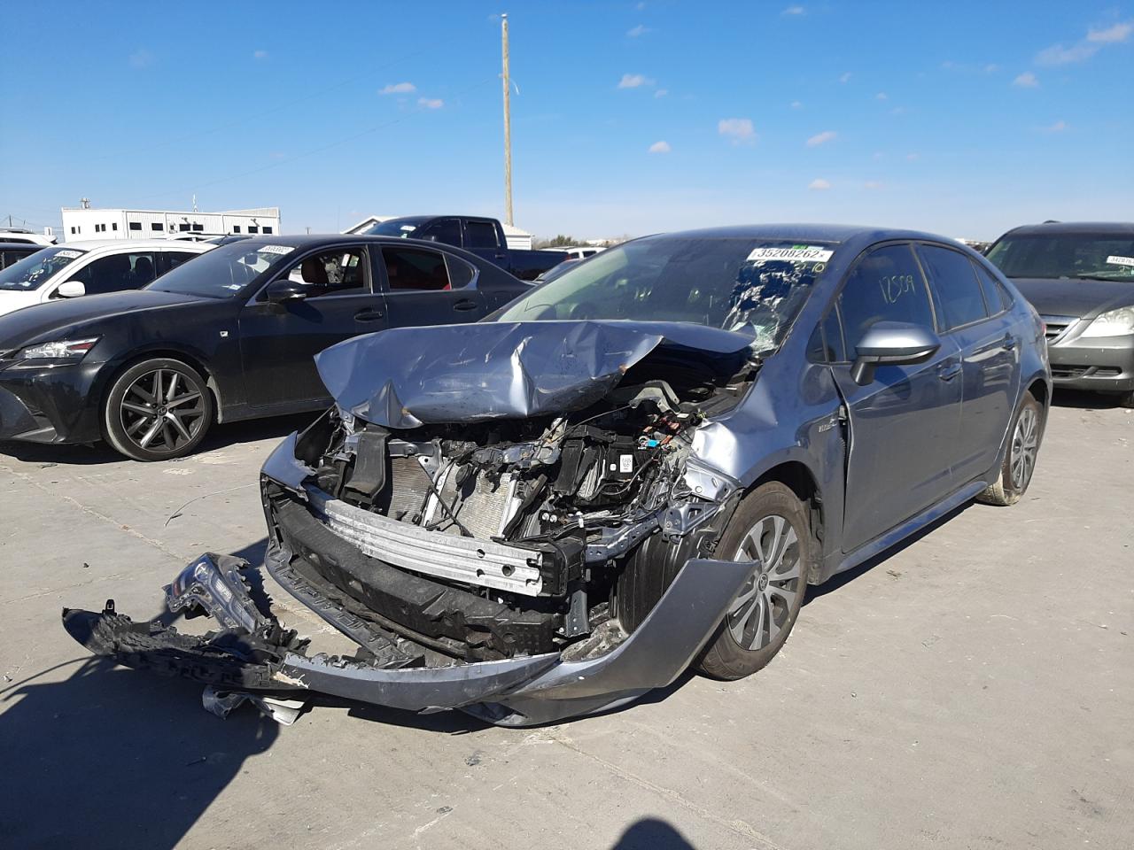 Photo 2 from auction – 2021 TOYOTA COROLLA LE with VIN JTDEAMDE0MJ005280