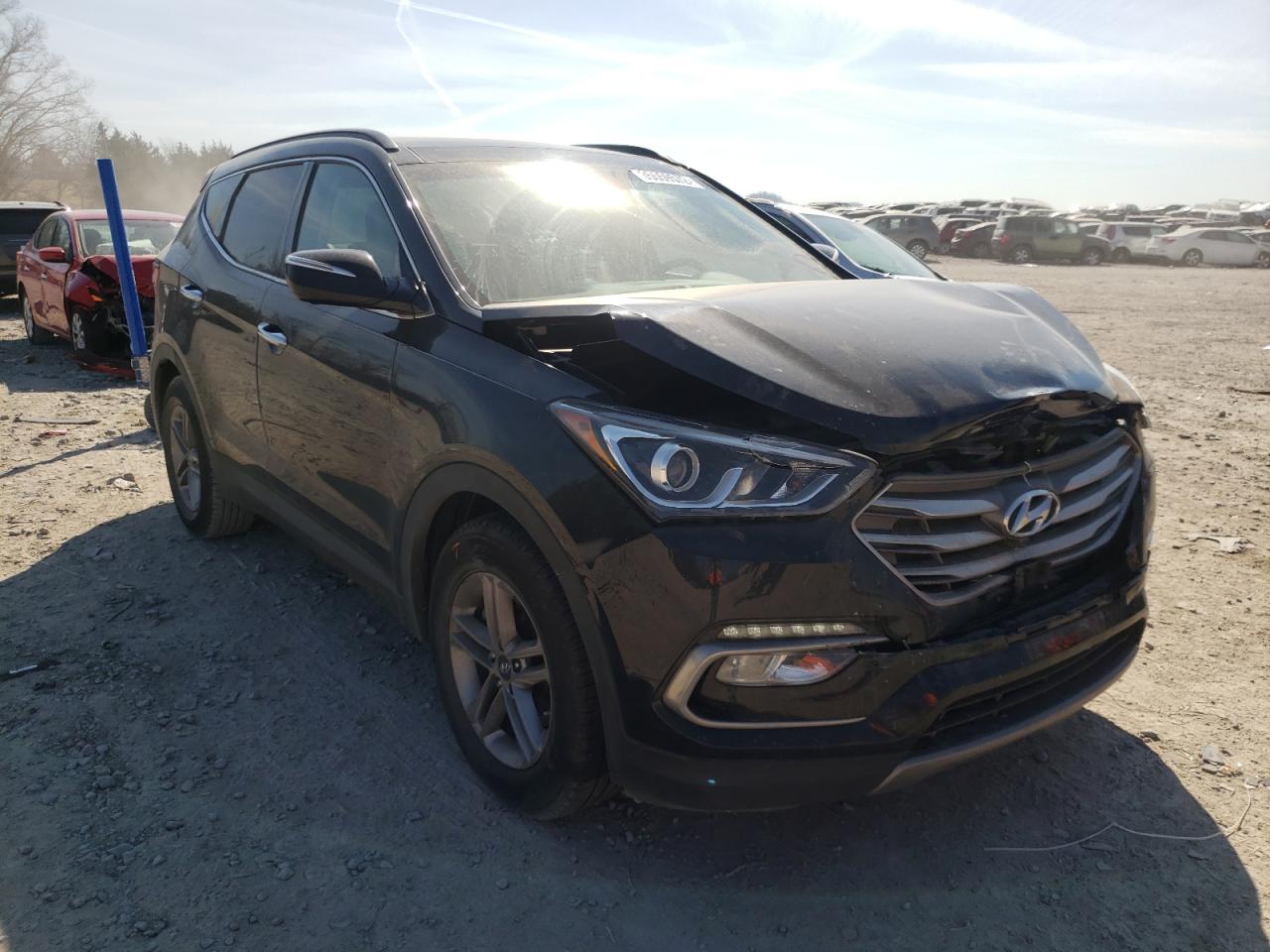 HYUNDAI SANTA FE S 2017 with VIN 5NMZU3LB3HH033578 - Photo from auction