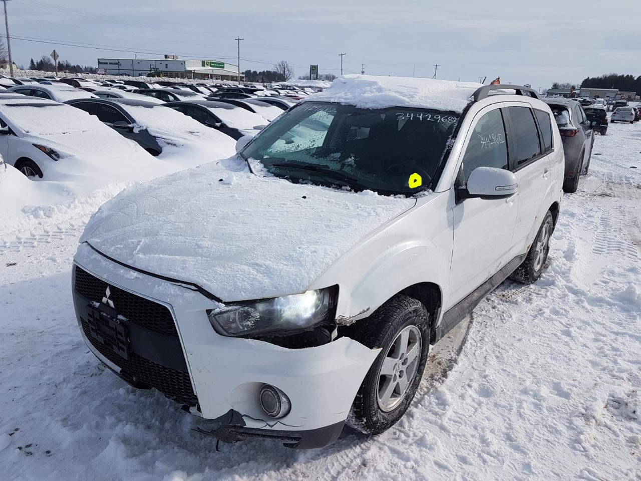 Photo 2 from auction – 2010 MITSUBISHI OUTLANDER with VIN JA4JT3AX7AZ609604