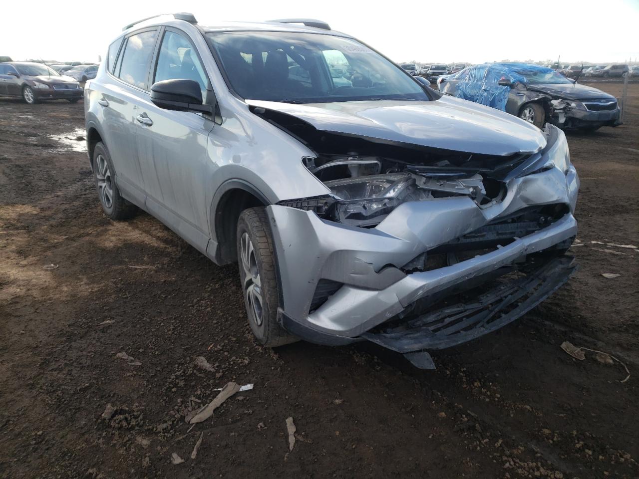 TOYOTA RAV4 LE 2018 with VIN 2T3BFREV8JW757368 - Photo from auction