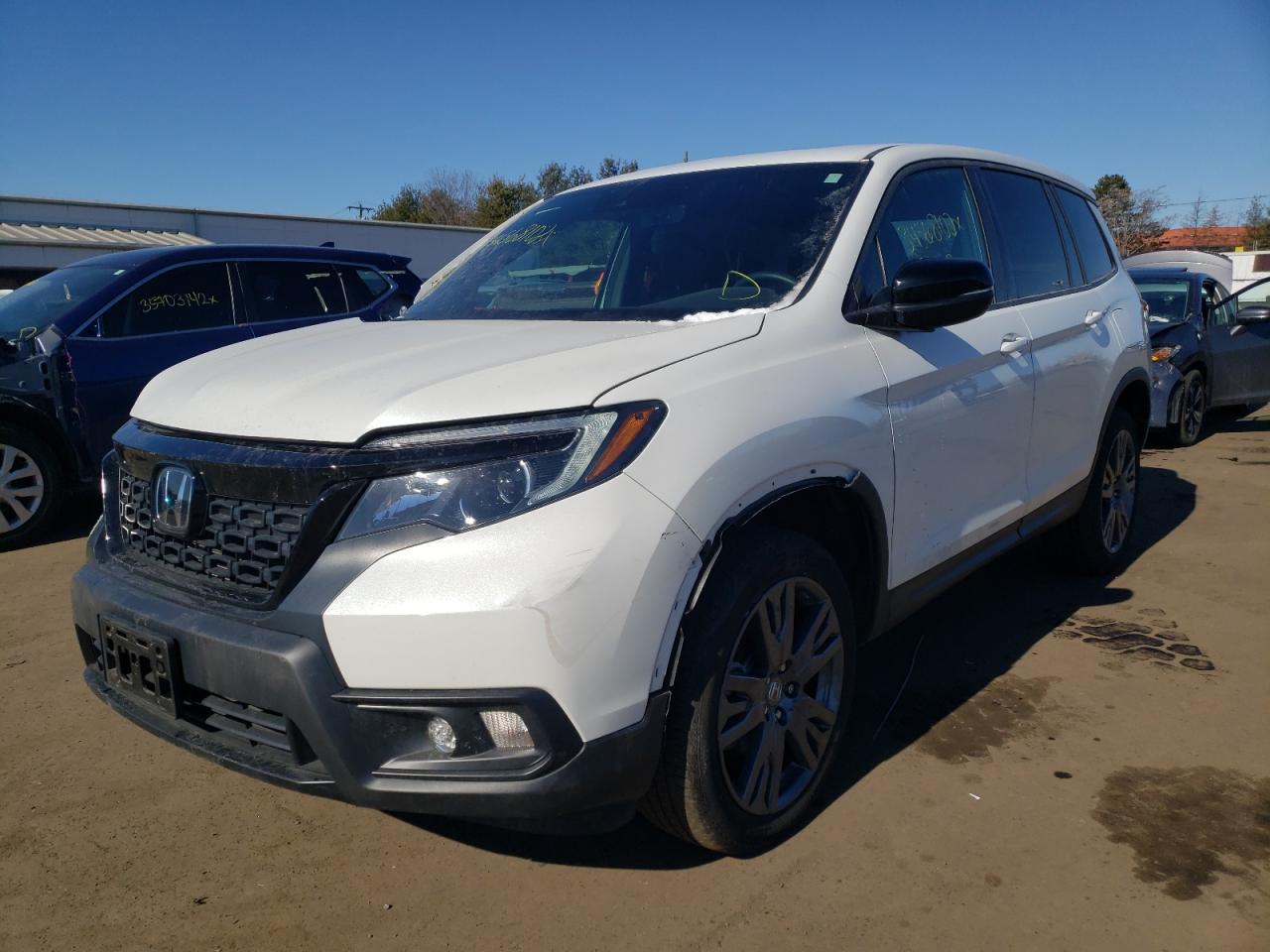 Photo 2 from auction – 2021 HONDA PASSPORT E with VIN 5FNYF8H50MB006811