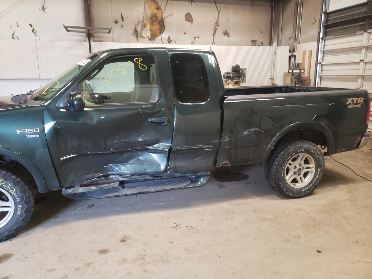 Photo 9 from auction – 2003 FORD F150 with VIN 2FTRX18L33CA01129