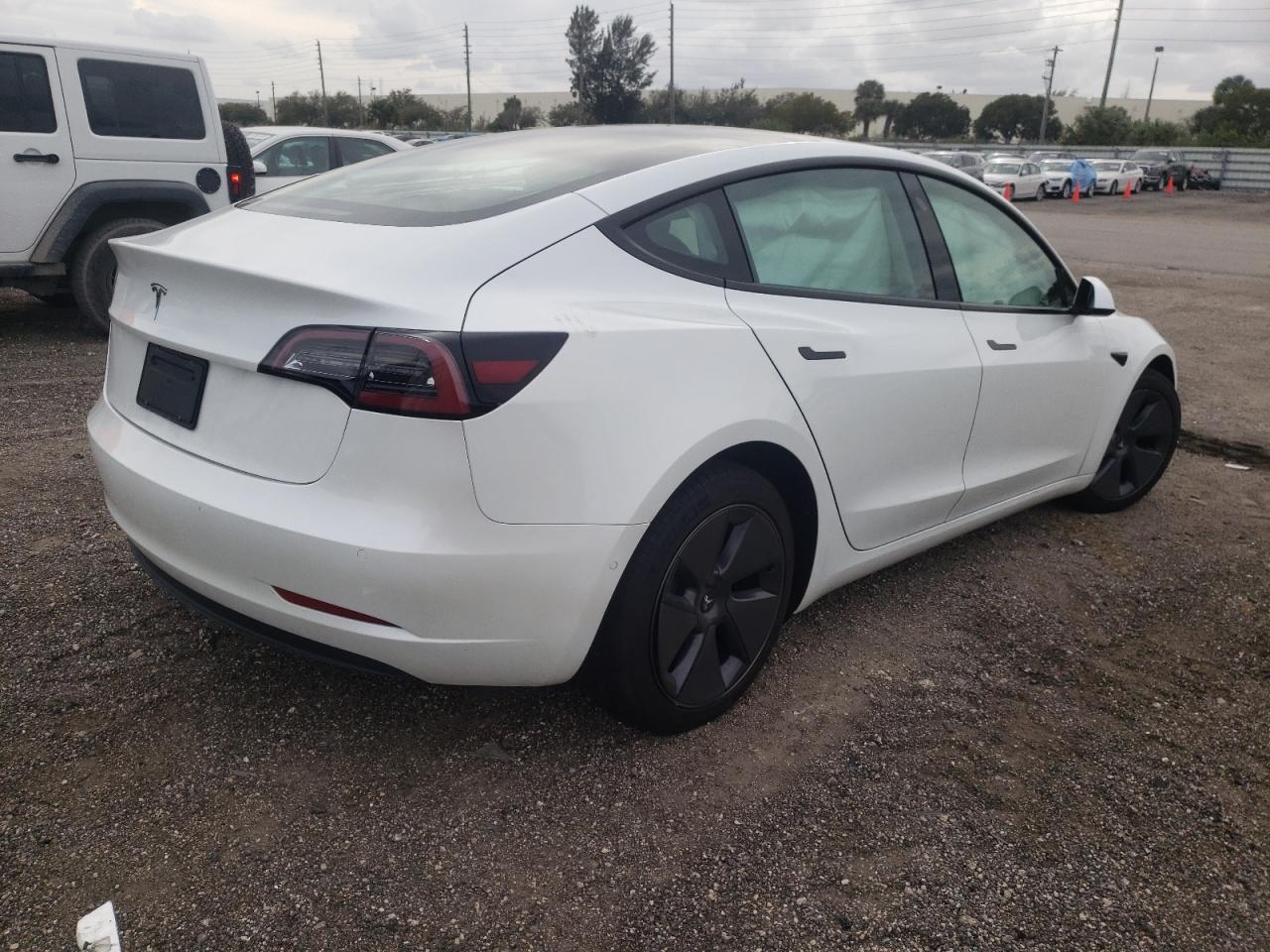 Photo 4 from auction – 2021 TESLA MODEL 3 with VIN 5YJ3E1EA2MF017363