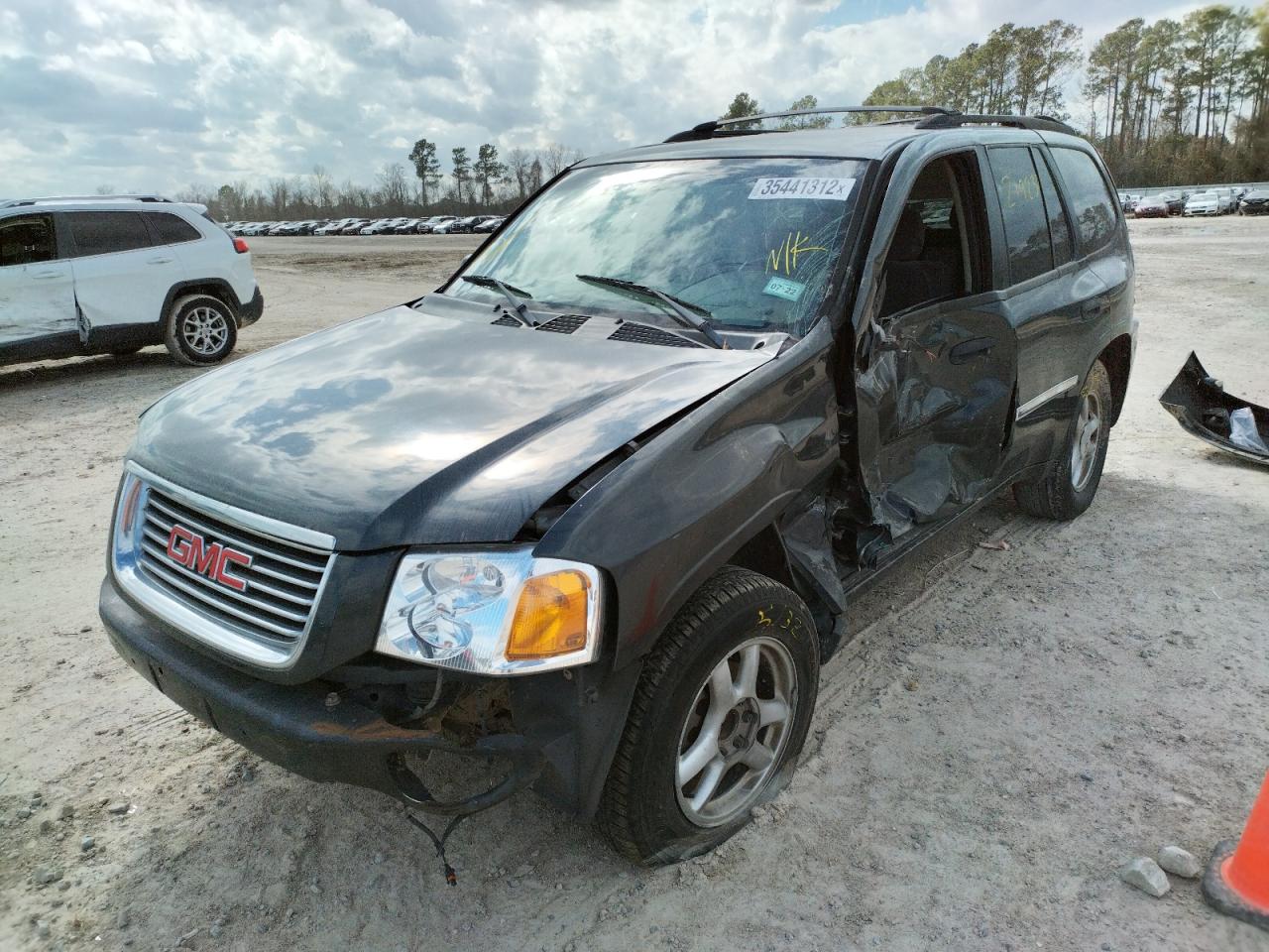 Photo 2 from auction – 2006 GMC ENVOY with VIN 1GKDS13SX62322077