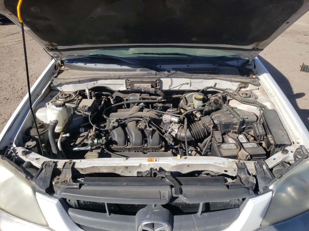 Photo 7 from auction – 2002 MAZDA TRIBUTE LX with VIN 4F2CU09162KM17935