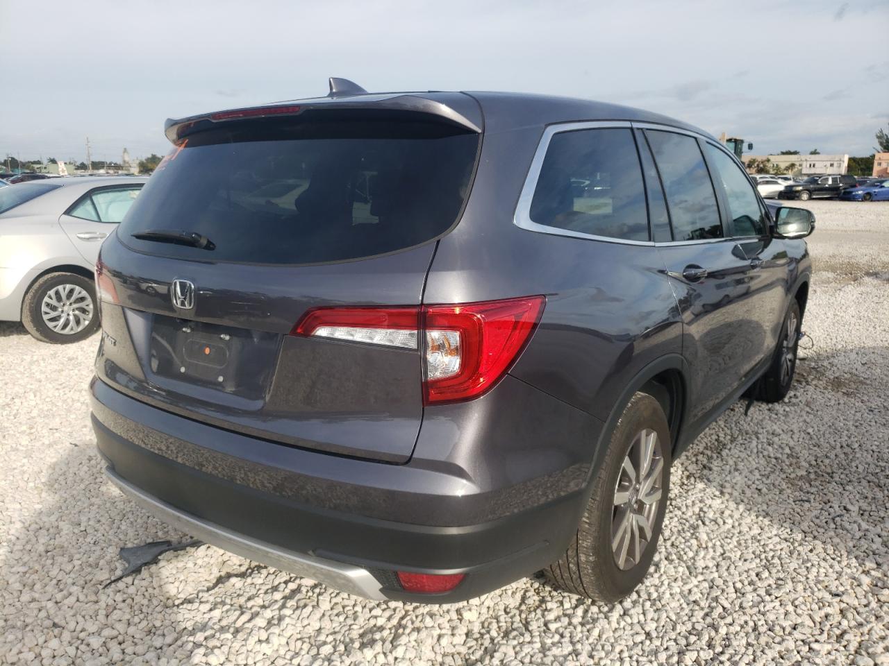 Photo 4 from auction – 2021 HONDA PILOT EXL with VIN 5FNYF5H50MB026829