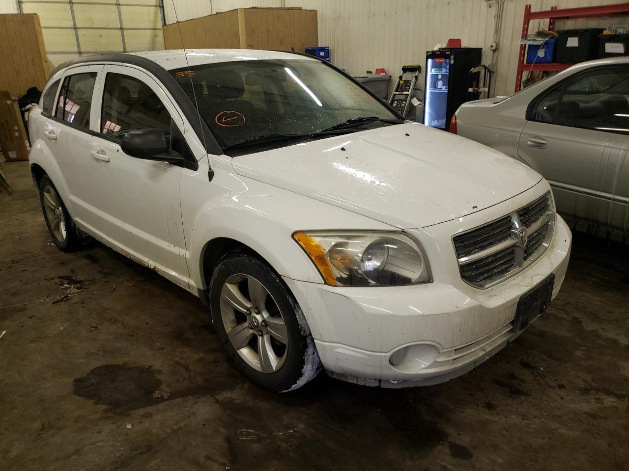 DODGE CALIBER MA 2011 with VIN 1B3CB3HA8BD257152 - Photo from auction