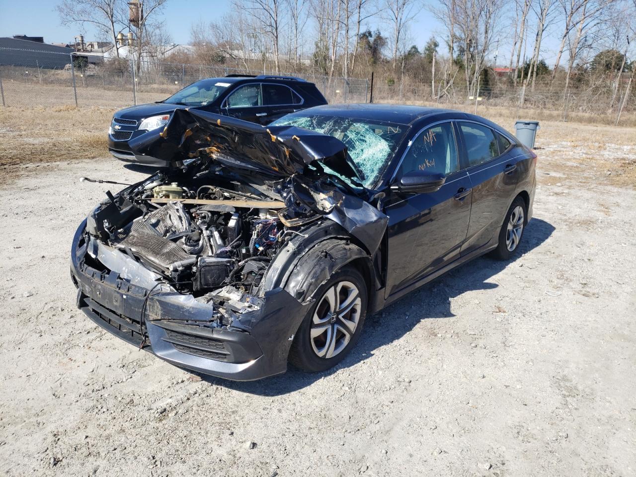 Photo 2 from auction – 2016 HONDA CIVIC LX with VIN 19XFC2F59GE030986