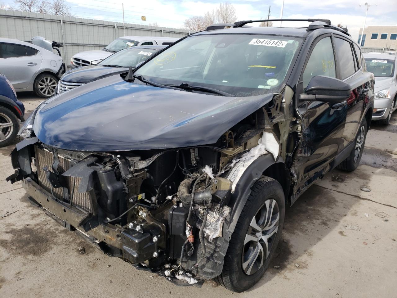 Photo 2 from auction – 2017 TOYOTA RAV4 LE with VIN 2T3BFREV8HW586633