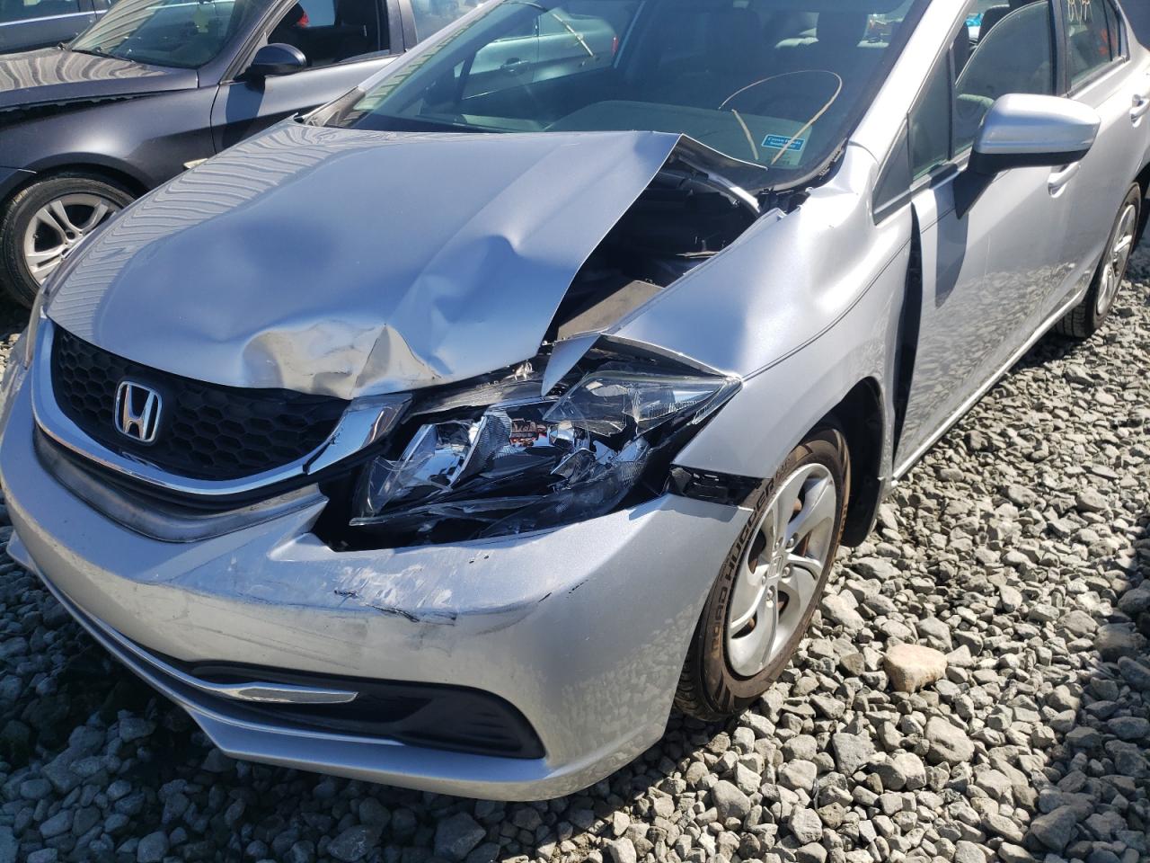 Photo 9 from auction – 2014 HONDA CIVIC LX with VIN 19XFB2F50EE254101