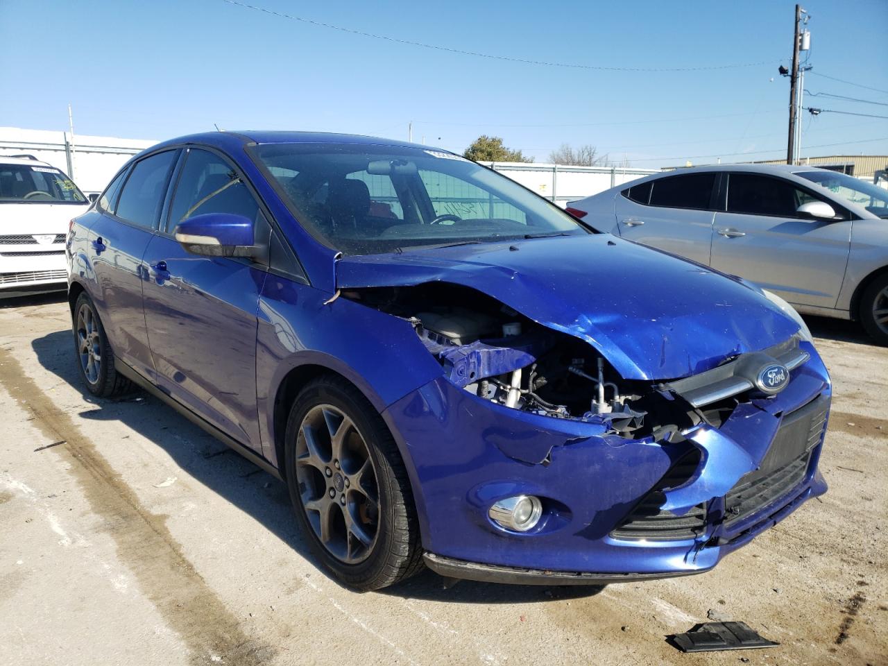 FORD FOCUS SE 2013 with VIN 1FADP3F25DL157038 - Photo from auction