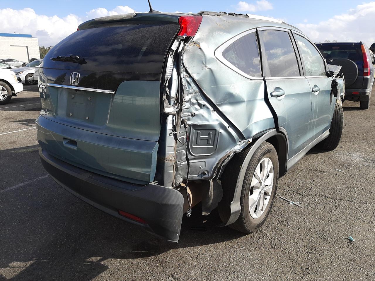 Photo 4 from auction – 2013 HONDA CR-V EXL with VIN 5J6RM3H79DL013682