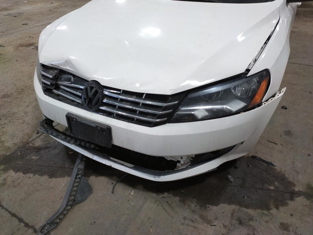 Photo 9 from auction – 2014 VOLKSWAGEN PASSAT SE with VIN 1VWBN7A32EC093201