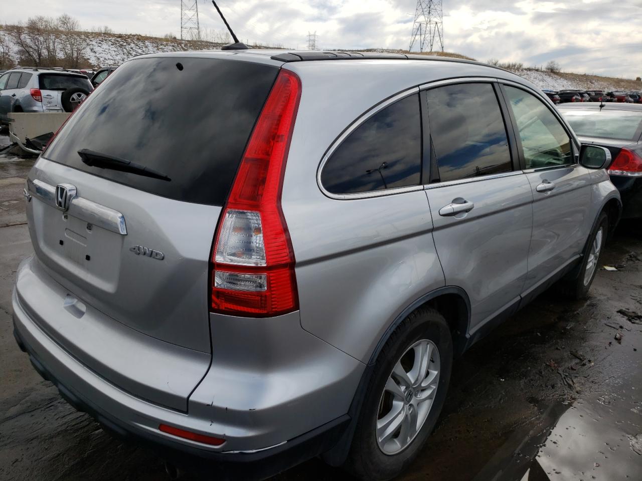 Photo 4 from auction – 2011 HONDA CR-V EXL with VIN JHLRE4H7XBC034162