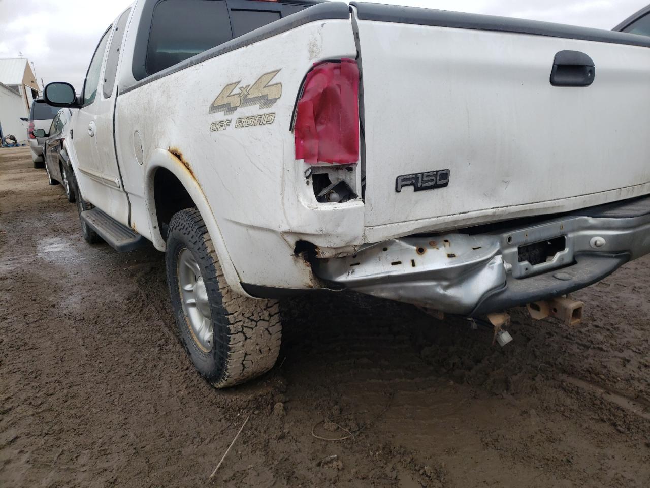 Photo 9 from auction – 1999 FORD F150 with VIN 1FTRX18L8XKC14868