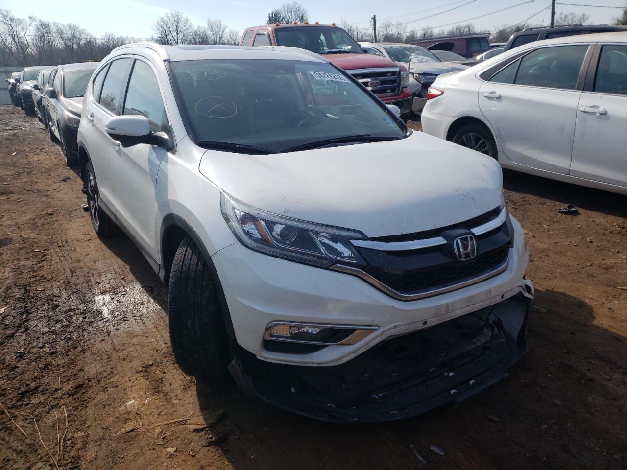 HONDA CR-V TOURI 2016 with VIN 5J6RM4H99GL011698 - Photo from auction