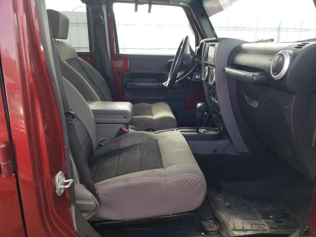 Photo 5 from auction – 2010 JEEP WRANGLER U with VIN 1J4BA5H16AL102106