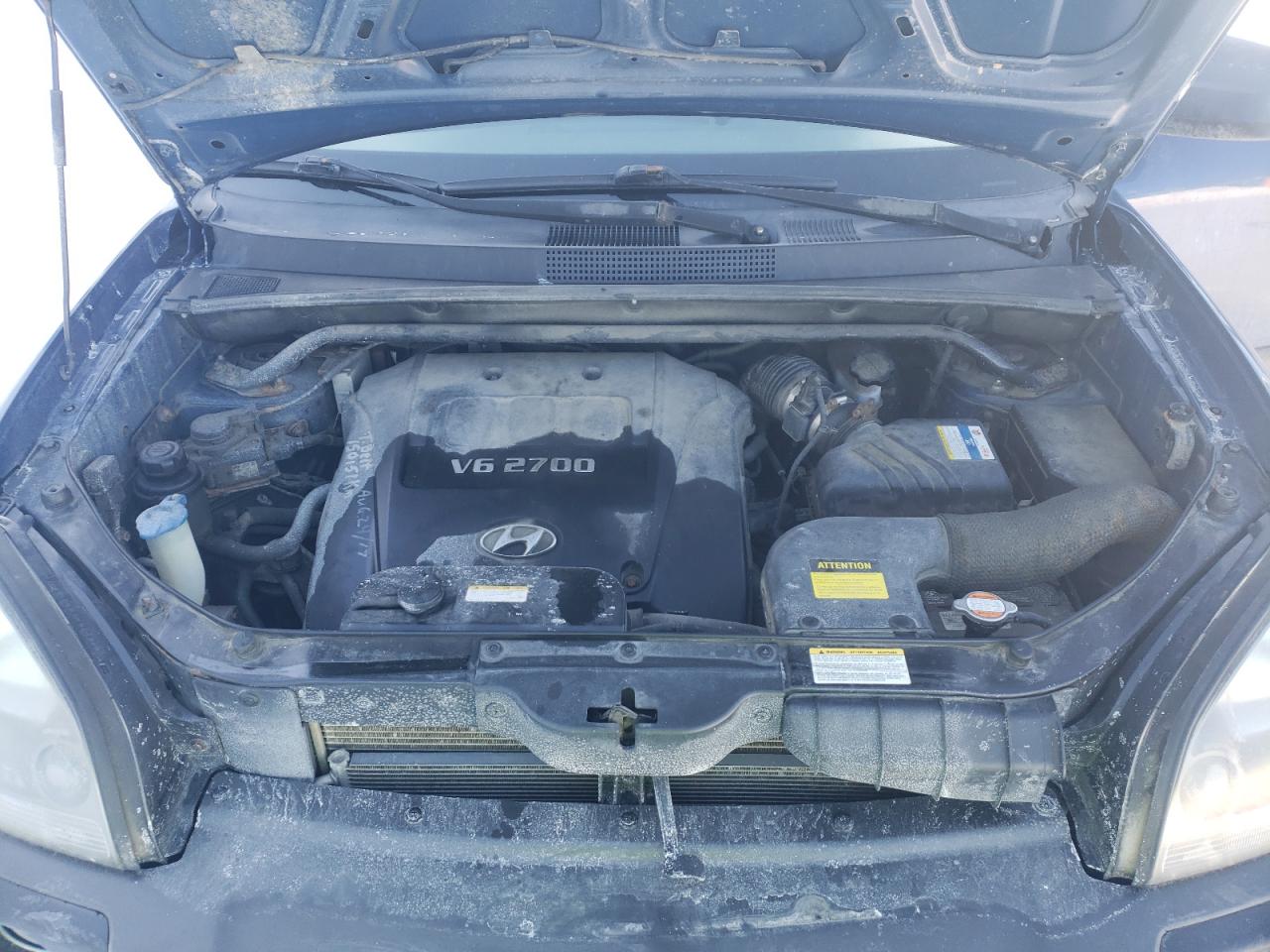 Photo 7 from auction – 2007 HYUNDAI TUCSON GL with VIN KM8JM72D37U570400
