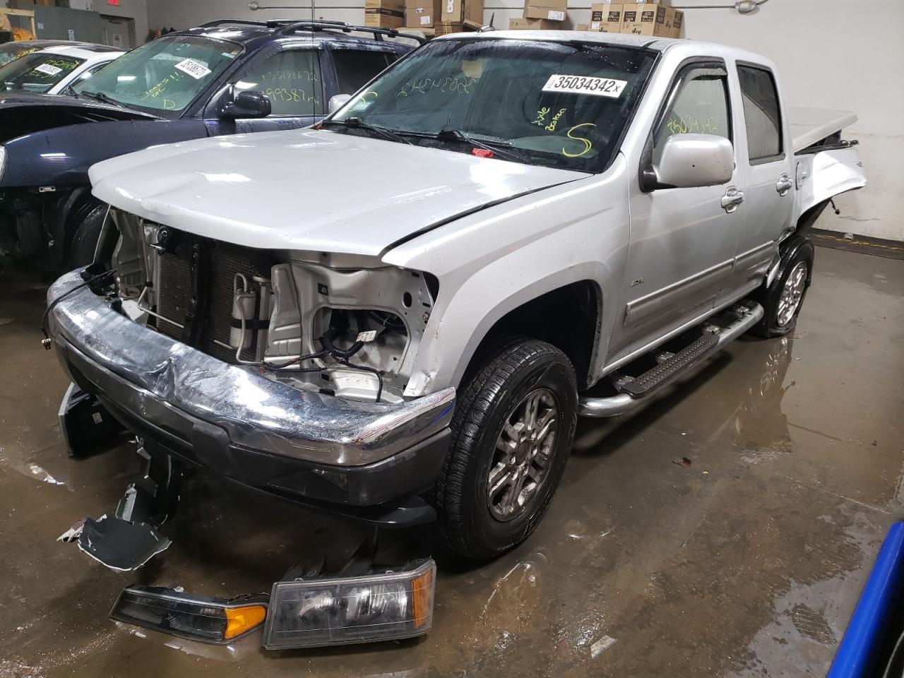 Photo 2 from auction – 2012 GMC CANYON SLE with VIN 1GTH6PFEXC8103297