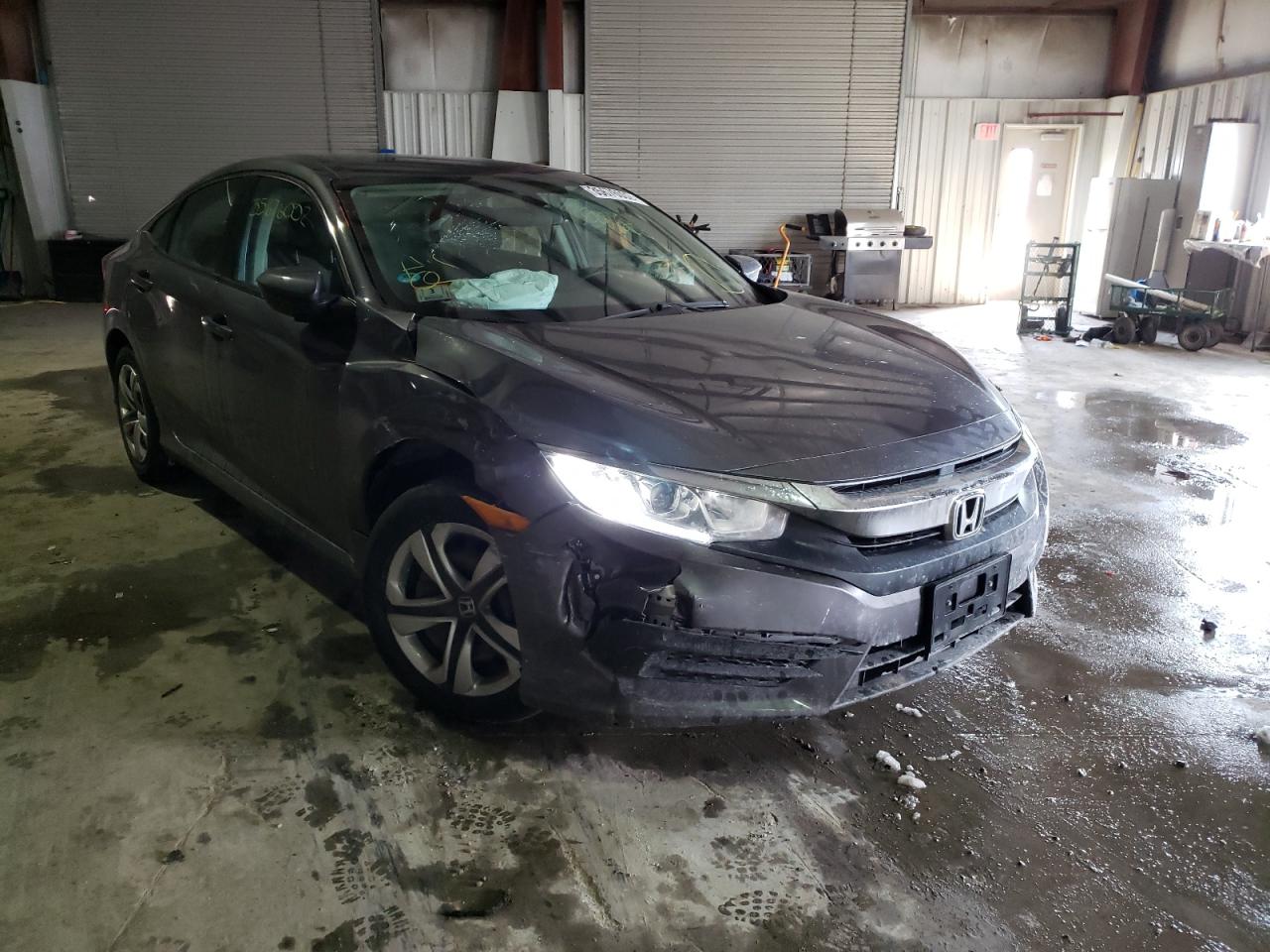 Photo 1 from auction – 2018 HONDA CIVIC LX with VIN 19XFC2F54JE203160