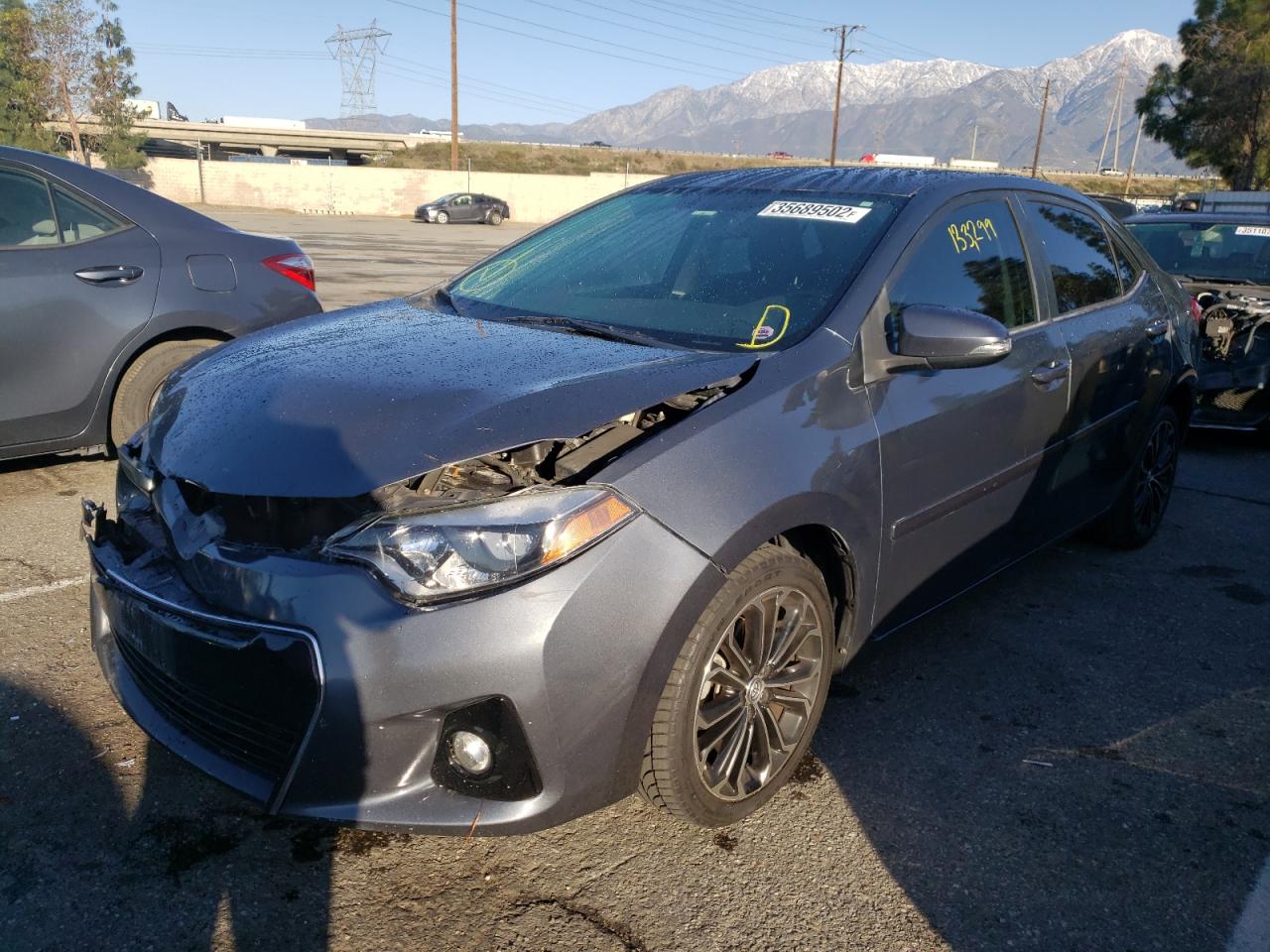 Photo 2 from auction – 2015 TOYOTA COROLLA L with VIN 5YFBURHE0FP289607