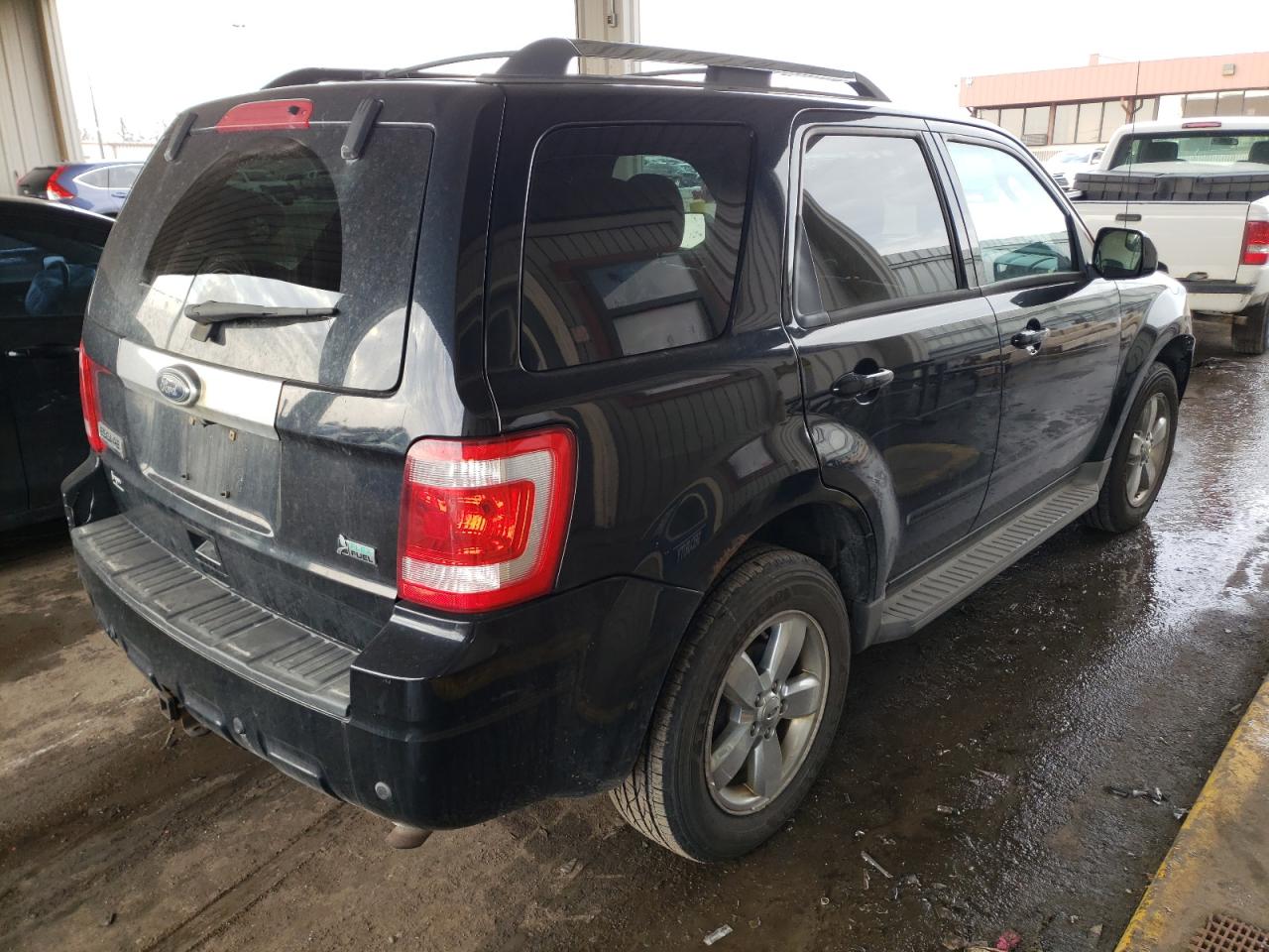 Photo 4 from auction – 2010 FORD ESCAPE LIM with VIN 1FMCU9EG6AKB64401