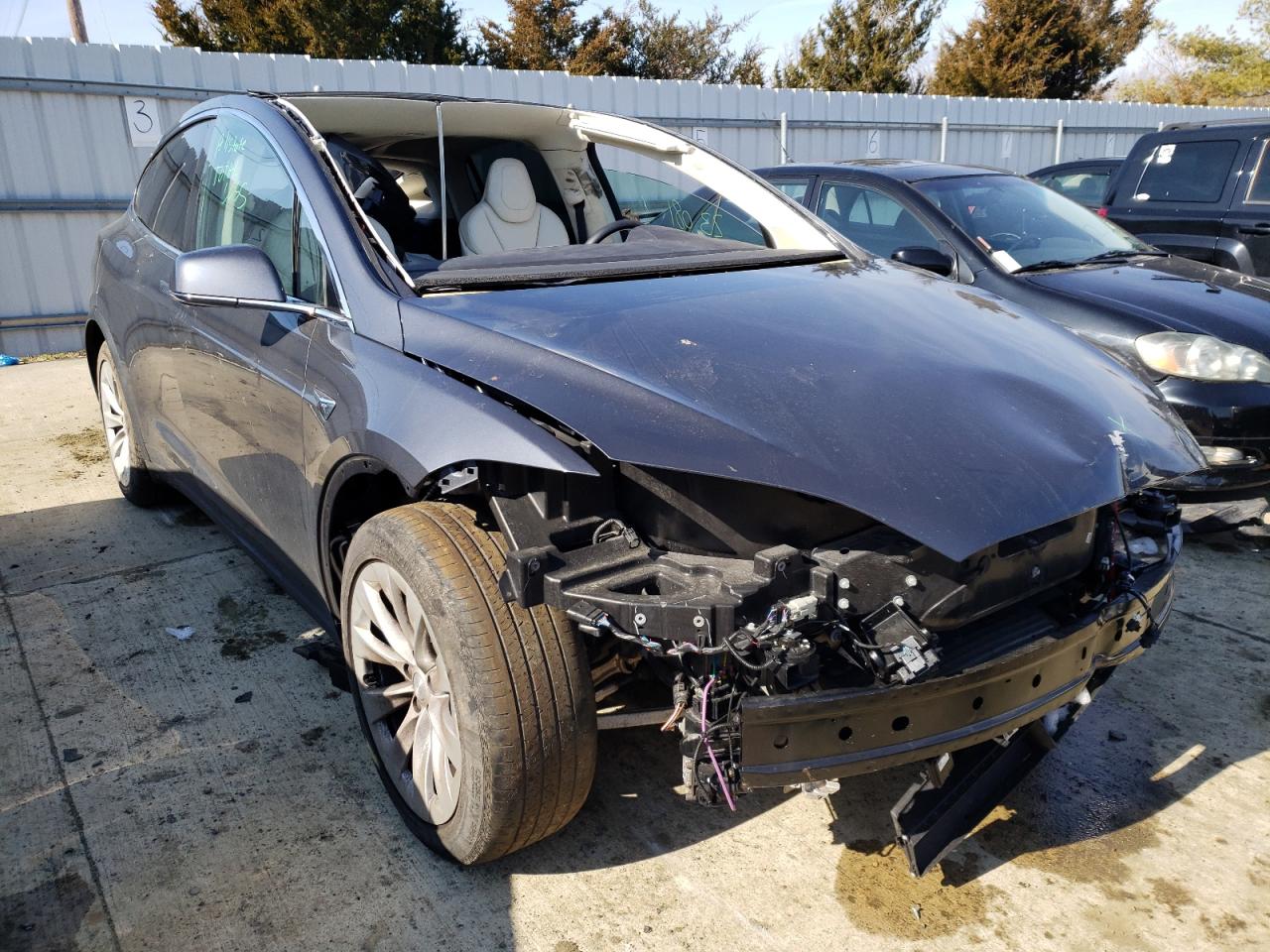 TESLA MODEL X 2019 with VIN 5YJXCAE27KF185769 - Photo from auction