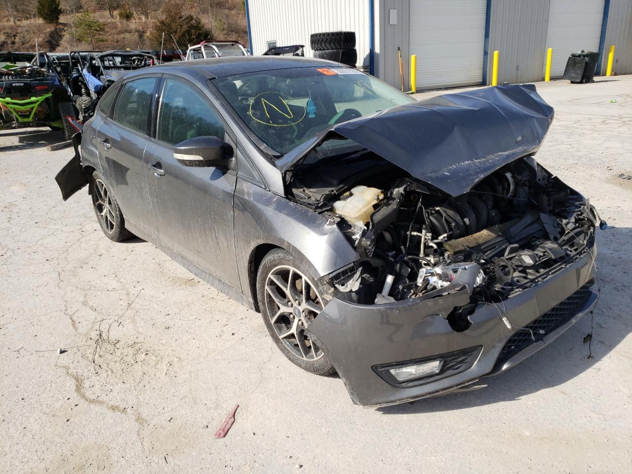 FORD FOCUS SE 2015 with VIN 1FADP3F24FL254332 - Photo from auction