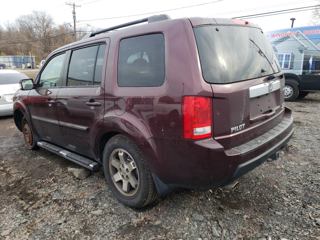 Photo 3 from auction – 2011 HONDA PILOT TOUR with VIN 5FNYF4H91BB022038