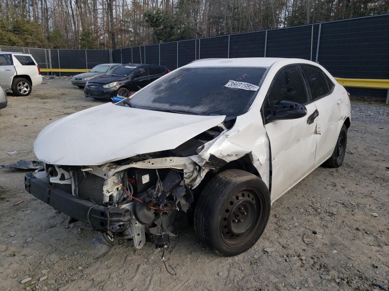 Photo 2 from auction – 2014 TOYOTA COROLA with VIN 2T1BURHE2EC206953