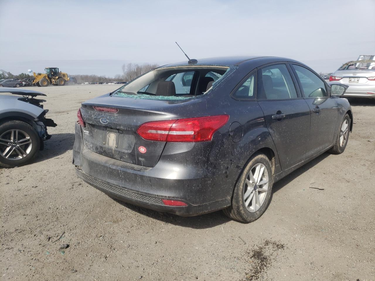 Photo 4 from auction – 2018 FORD FOCUS SE with VIN 1FADP3F20JL315619