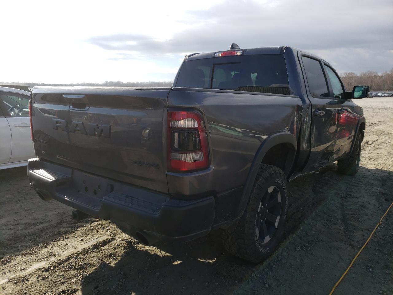 Photo 4 from auction – 2021 RAM 1500 REBEL with VIN 1C6SRFLT2MN551179