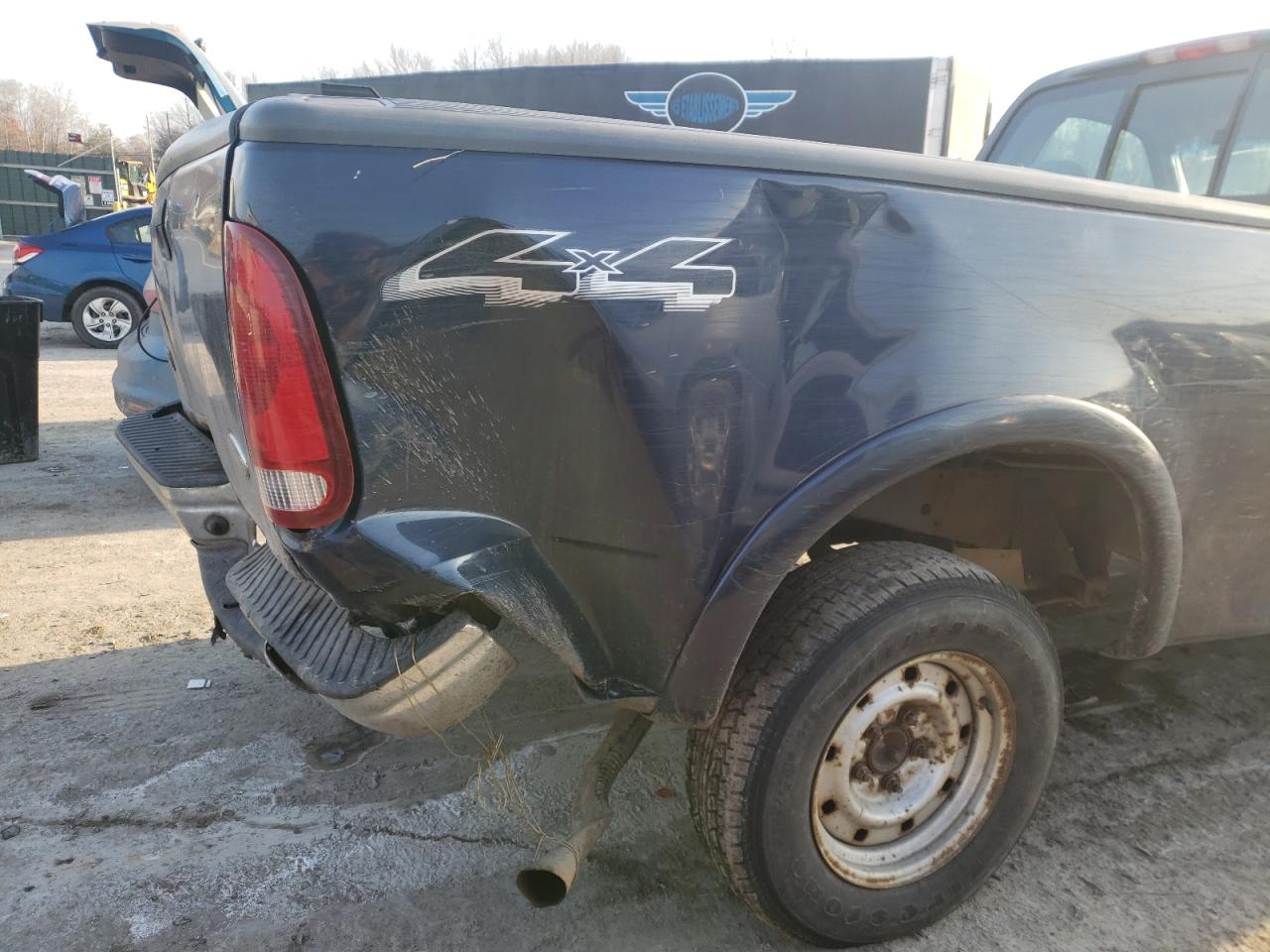 Photo 9 from auction – 2002 FORD F150 with VIN 2FTRF18282CA71461