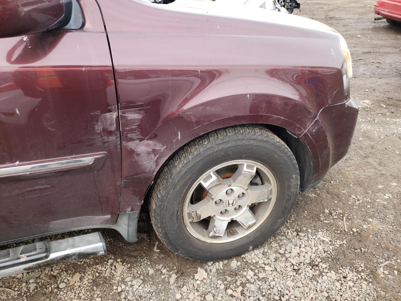 Photo 9 from auction – 2011 HONDA PILOT TOUR with VIN 5FNYF4H91BB022038