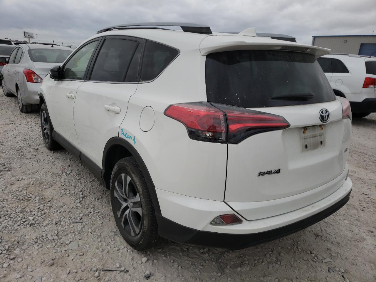 Photo 3 from auction – 2017 TOYOTA RAV4 LE with VIN JTMZFREV5HJ703579