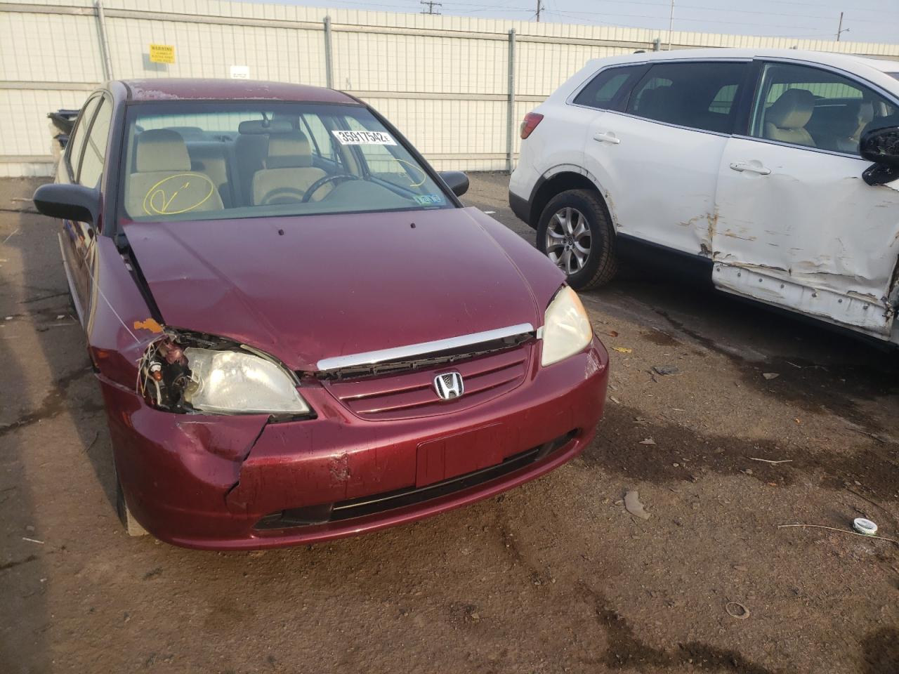 Photo 9 from auction – 2002 HONDA CIVIC LX with VIN 2HGES16582H601424