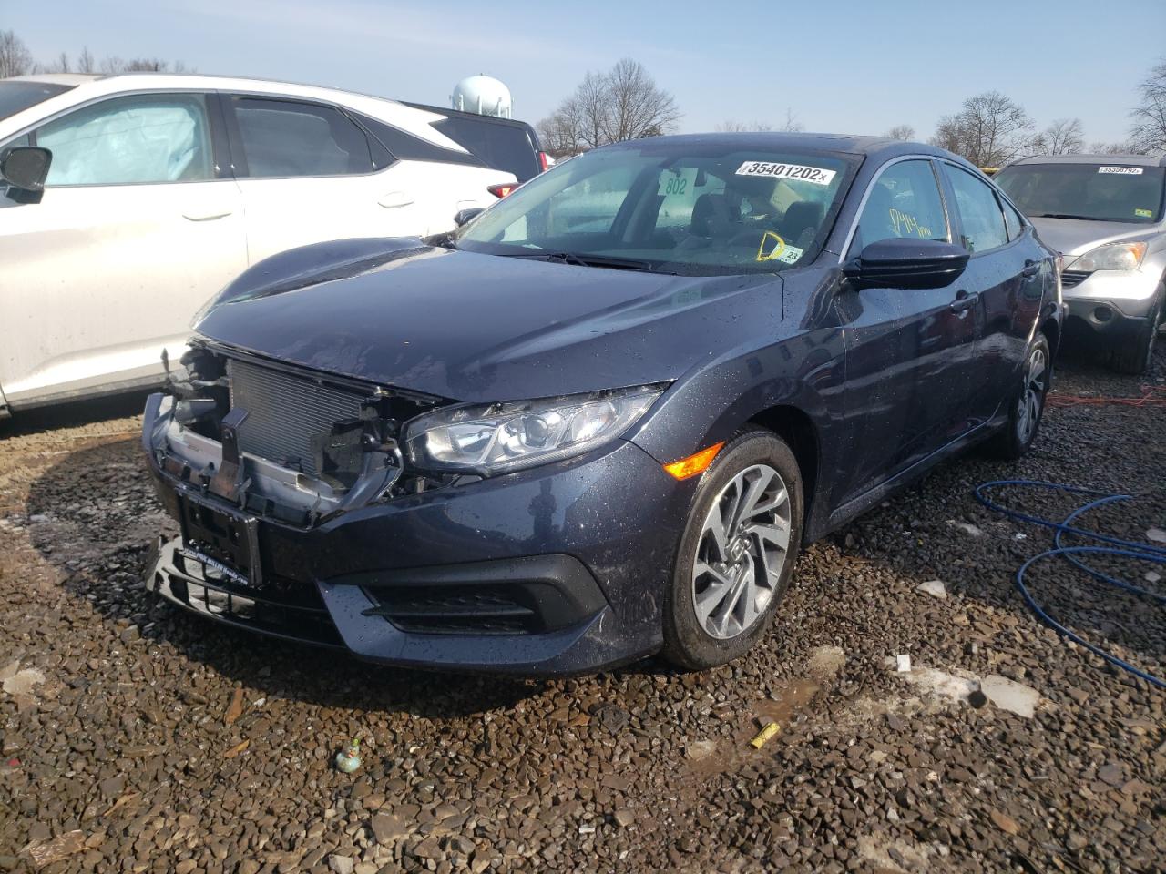Photo 2 from auction – 2018 HONDA CIVIC EX with VIN 2HGFC2F76JH579883