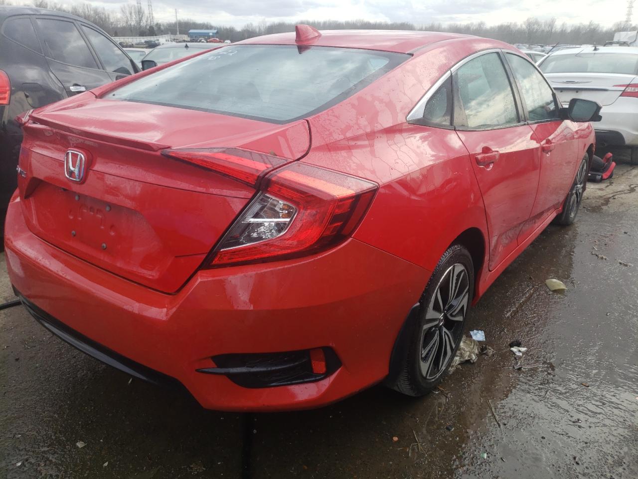 Photo 4 from auction – 2016 HONDA CIVIC EXL with VIN 2HGFC1F77GH652102