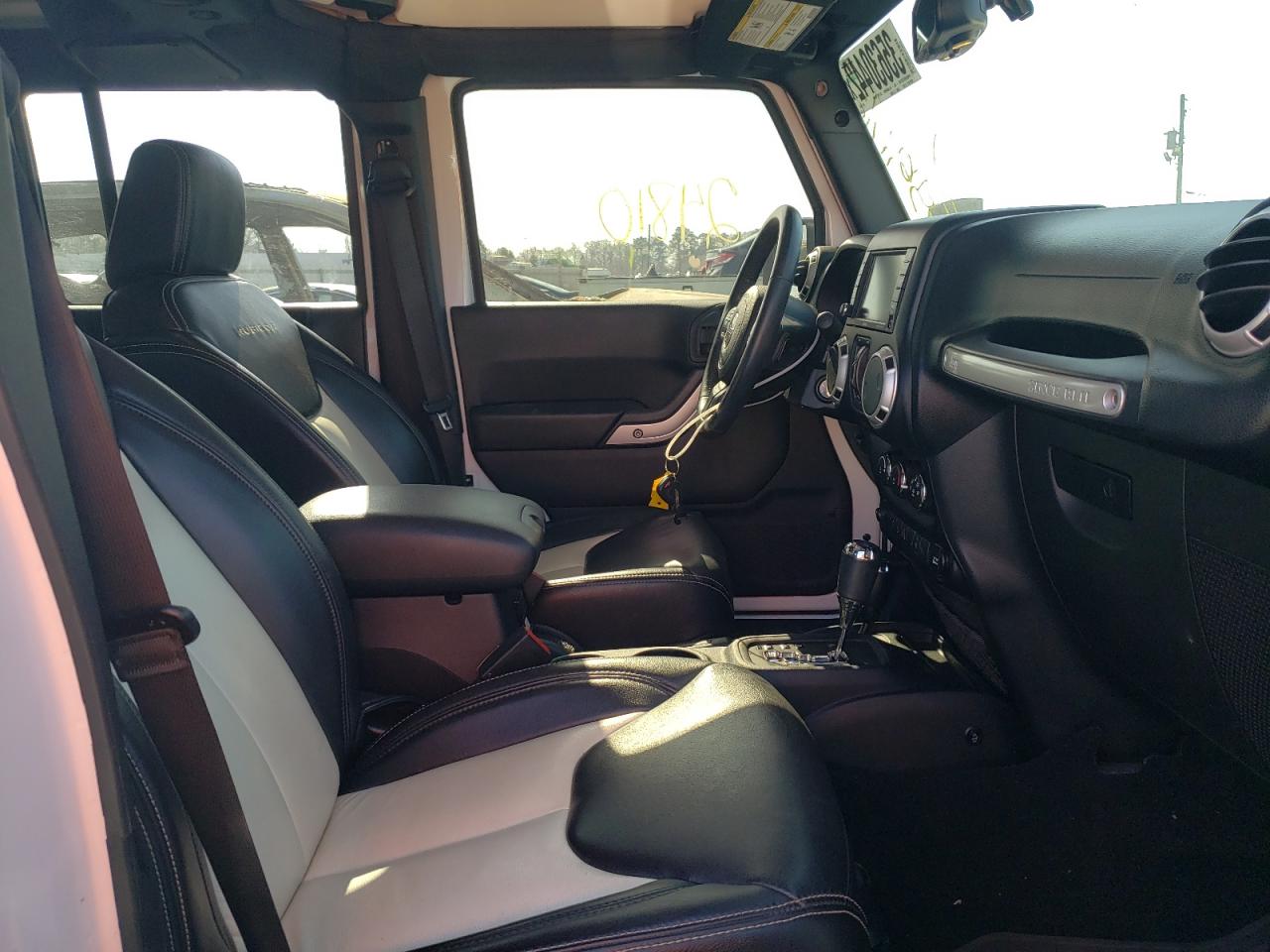 Photo 5 from auction – 2016 JEEP WRANGLER U with VIN 1C4BJWFG4GL118302