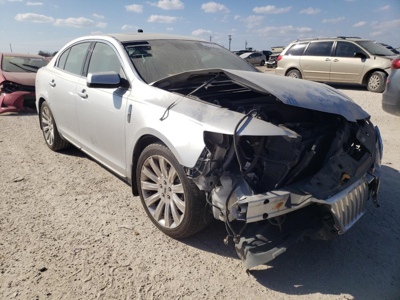 LINCOLN MKS 2011 with VIN 1LNHL9FT0BG613998 - Photo from auction
