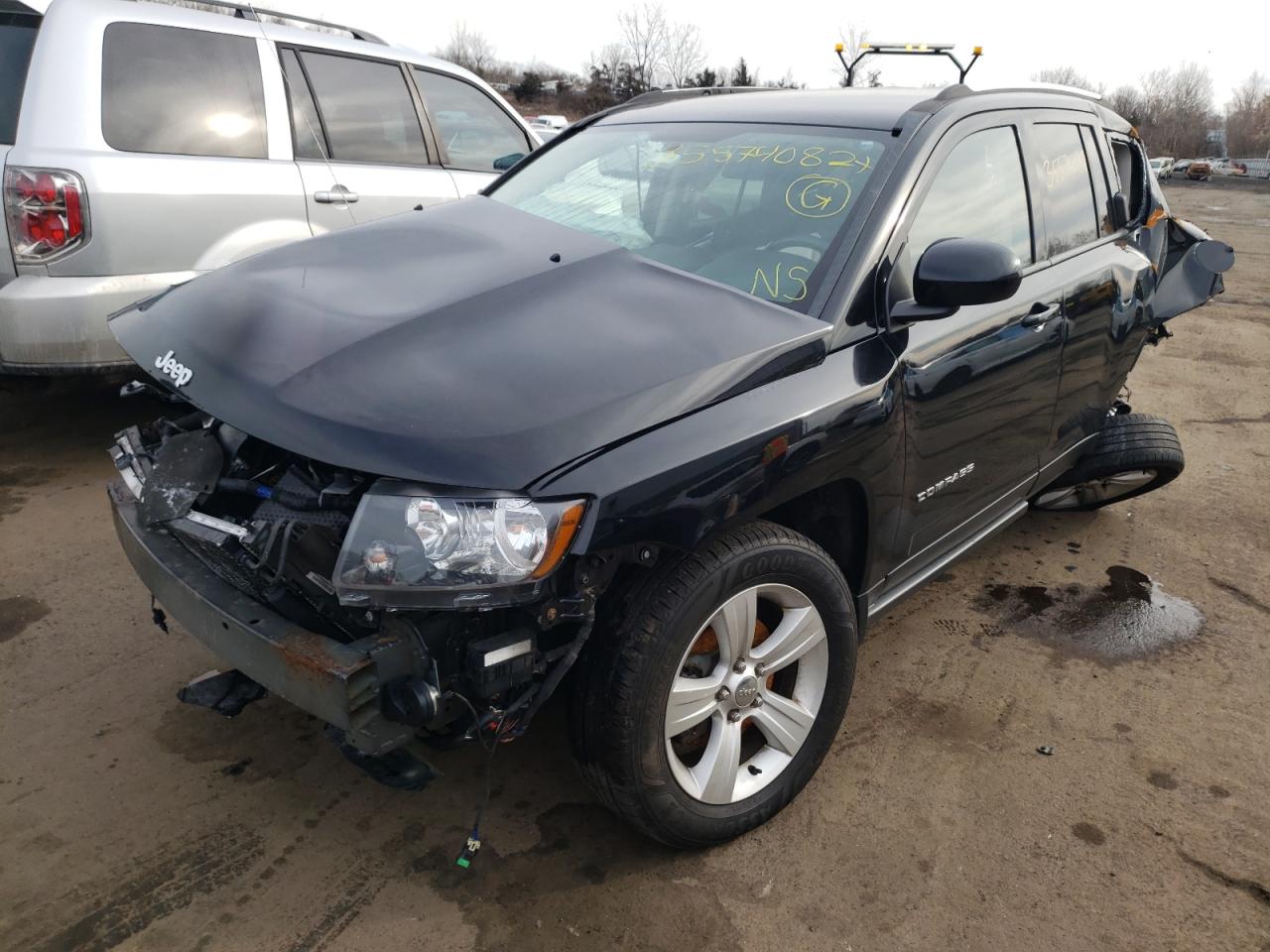 Photo 2 from auction – 2014 JEEP COMPASS LA with VIN 1C4NJDEB0ED707023